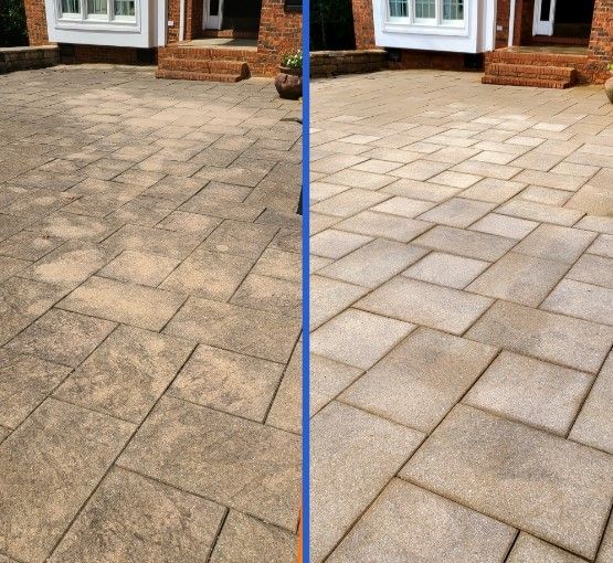 Side-by-side comparison of stone patio before and after cleaning, showing stained vs. clean surface.